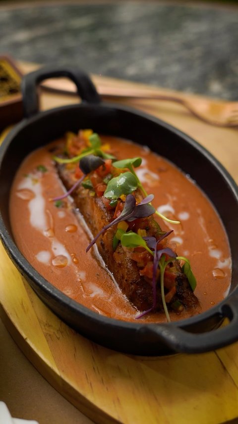 Experience the rich flavors of the coast with our Swahili Coconut Fish—perfectly grilled Nile perch gently simmered in a creamy coconut-tomato sauce, served with fluffy steamed rice.

A comforting classic, elevated the Baoli way.

Reserve your table today.