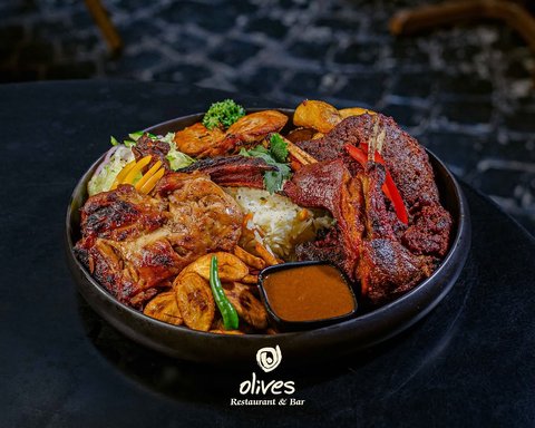 A table looks different when a platter arrives.

More colour. More flavour. More reasons to stay a little longer.

#oliveskampala #naguru #dining