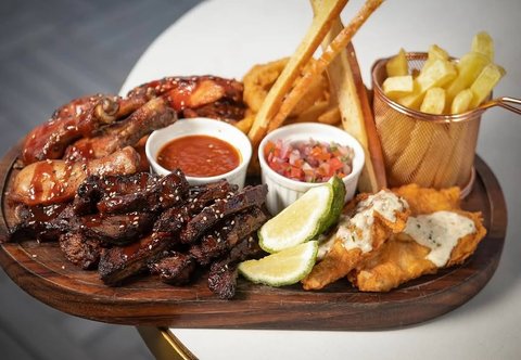 Good food is better when shared 🍽️✨
This platter for two at Noni Vie brings all the right flavors to the table.

#share #platter #uganda #meals