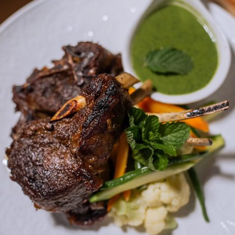 Today's highlight; Juicy lamb shanks, charred to perfection, nestled on a bed of fresh vegetables and finished with a refreshing mint sauce. A feast for both the eyes and the palate.

Experience the harmony flavors that define the Tavola table. 

Crafted with care, plated with purpose, and made to be remembered. ✨🍽️ 

 Call 0393000568 to reserve your table 
📍Tavola, Design Quater Plot 38, Kyadondo rd. Nakasero. 

#foodlovers
#foodstagram
#FineDiningExperience
#restaurants