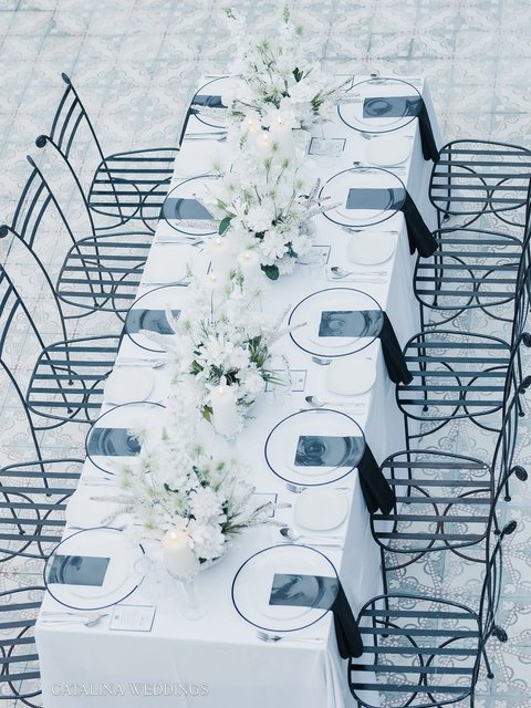 Clean lines. White blooms. Candlelight. Glass accents. A timeless proposal setting overlooking the beauty of @latitude0kampala 

By @catalinaweddingsug  X @dean_photography_ug

#catalinaweddingsug #fyp #trending #follow #wedding