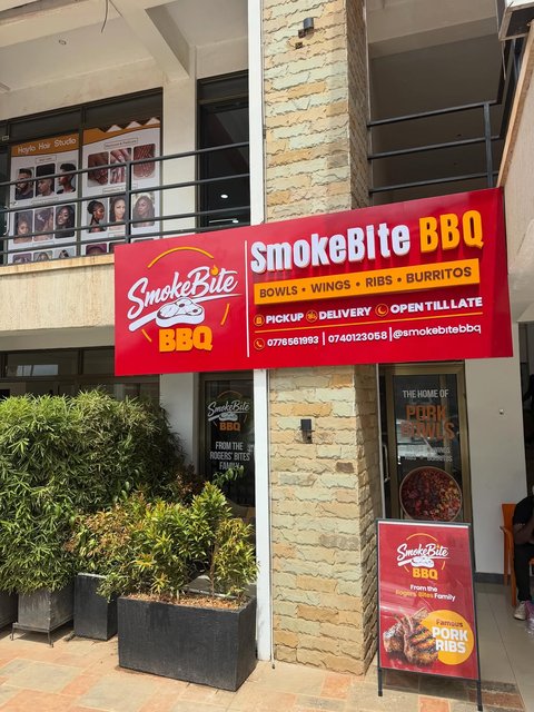 @smokebitebbq Kisaasi is finally open! 🎉🔥

Born from @rogers_bbq_and_bites and building on the food truck many of you knew as Rogers’ Bites on Wheels, SmokeBite BBQ is our home for quick individual BBQ meals: bowls, burritos, wings and ribs.

Our food truck remains at Forest Mall under the SmokeBite BBQ name, and we are excited to welcome our first proper restaurant branch in Kisaasi.

To everyone in Kisaasi, Kulambiro, Bukoto, Bahai, Komamboga, Kyanja, Ntinda and nearby areas, your favourite BBQ bowls are now closer to you.

Come for our Pork Bowls, Kikalayi Bowls, Chicken Bowls, Burritos, Wings and grilled pork ribs. 🥩

📍 Riviera Complex, Kisaasi
Between Ankore Foods and Mahe Pharmacy

📞 0776 561 993 WhatsApp available
📞 0740 123 058

Pass by, order for delivery, or find us on Glovo.

I will personally be at Kisaasi during the opening period to welcome you, take a selfie and thank you for supporting this new chapter. 🤗

SmokeBite BBQ Kisaasi is open. Come hungry.