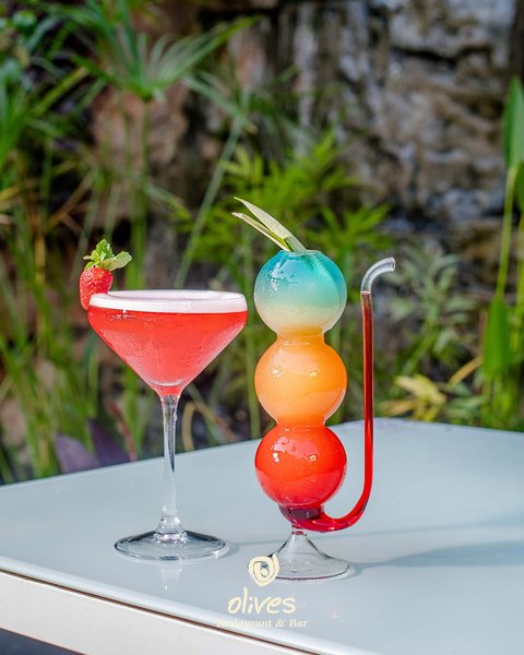 Leveling up the menu. 🍹 Left or right? Choose your vibe between Sinner’s Garden and the Rainbow Paradise.

Now pouring at Olives.

#oliveskampala #naguru #kampalafoodies #drinkstagram