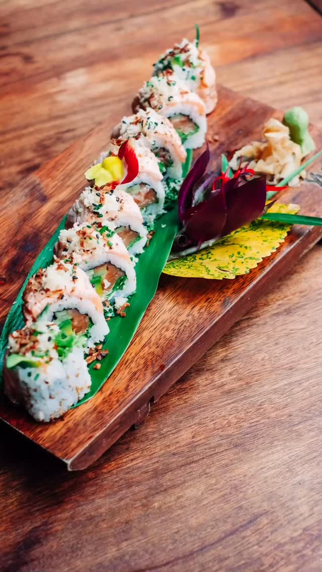 The Double Salmon Aburi Roll, where blowtorched salmon meets smoked salmon ribbons in a single, life-altering bite.