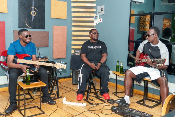 A brighter rehearsal evening with some bottles of Tusker malt on the side.